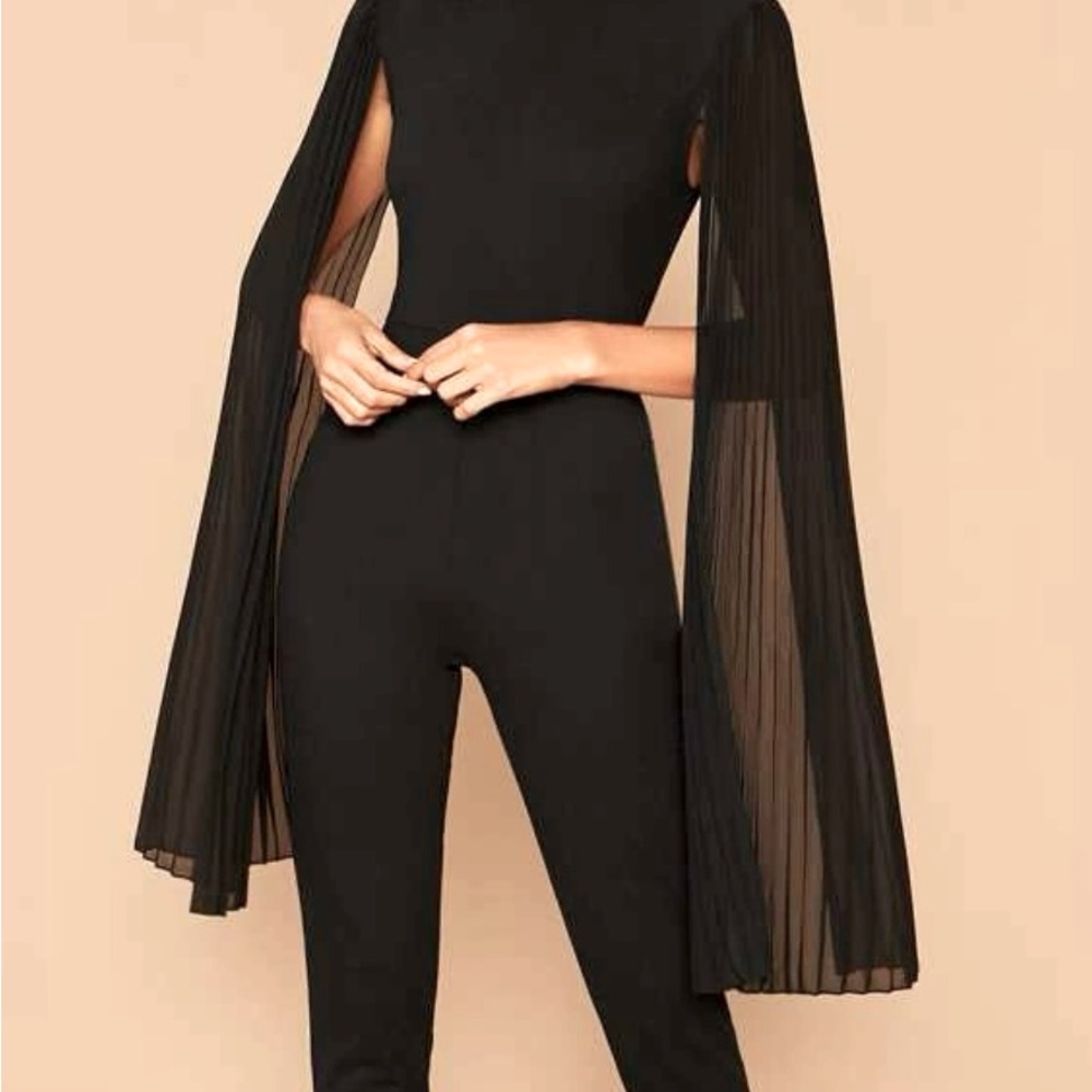Solid pleated cape jumpsuit.